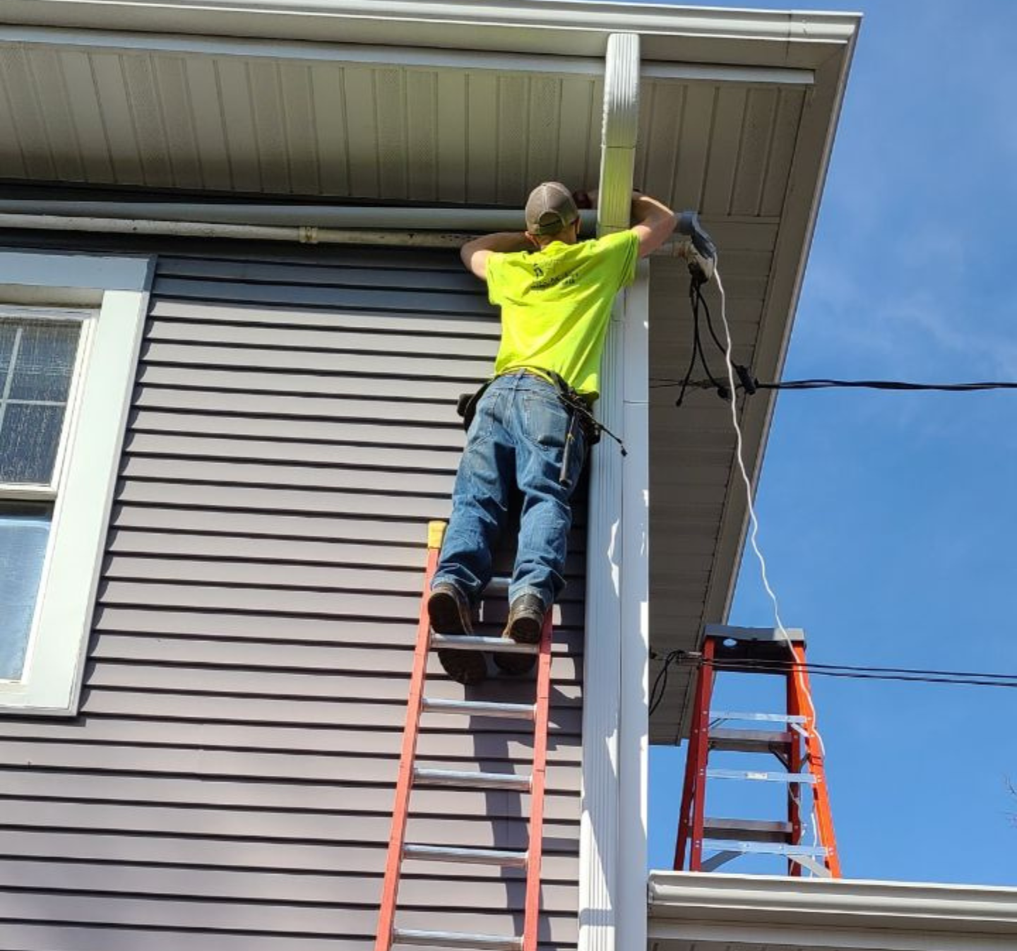 JTD Electric Employee Working on a Home